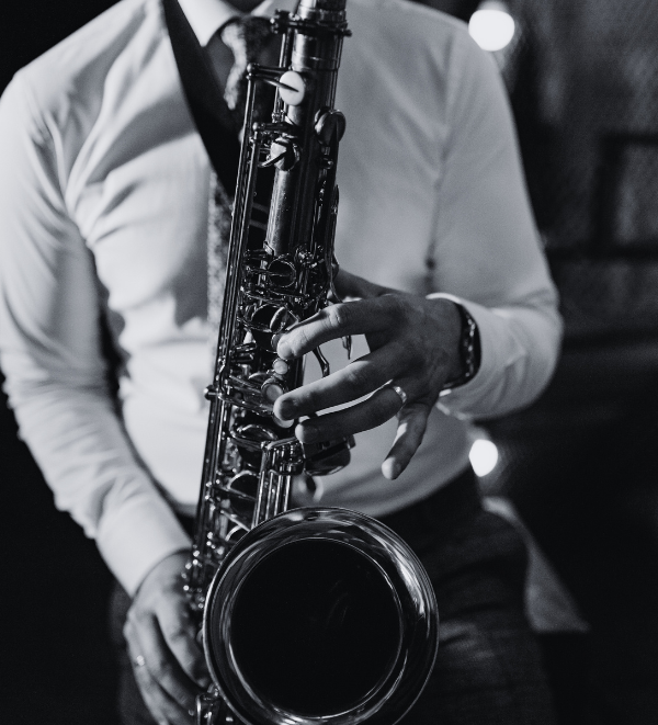 A musician playing a saxophone